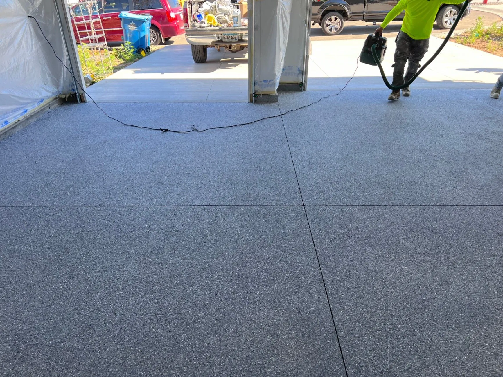 Fresh decorative flake epoxy flooring in Blaine, MN, during installation