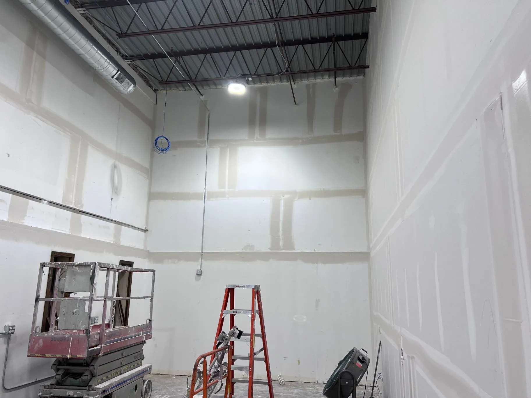 Drywall installed and joint compound applied in a commercial interior in Eden Prairie, MN