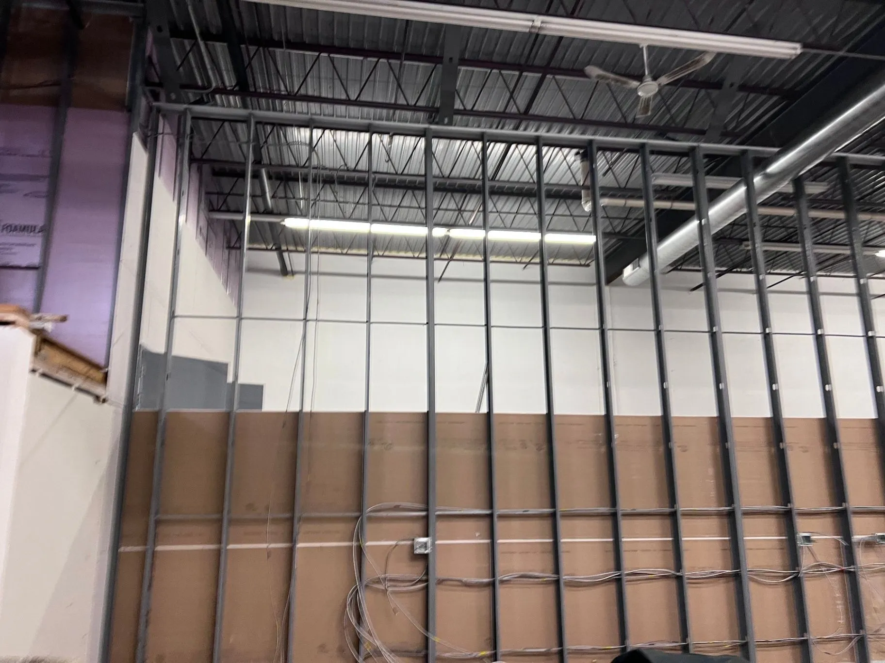 Metal framing and insulation preparation for commercial drywall in Eden Prairie, MN