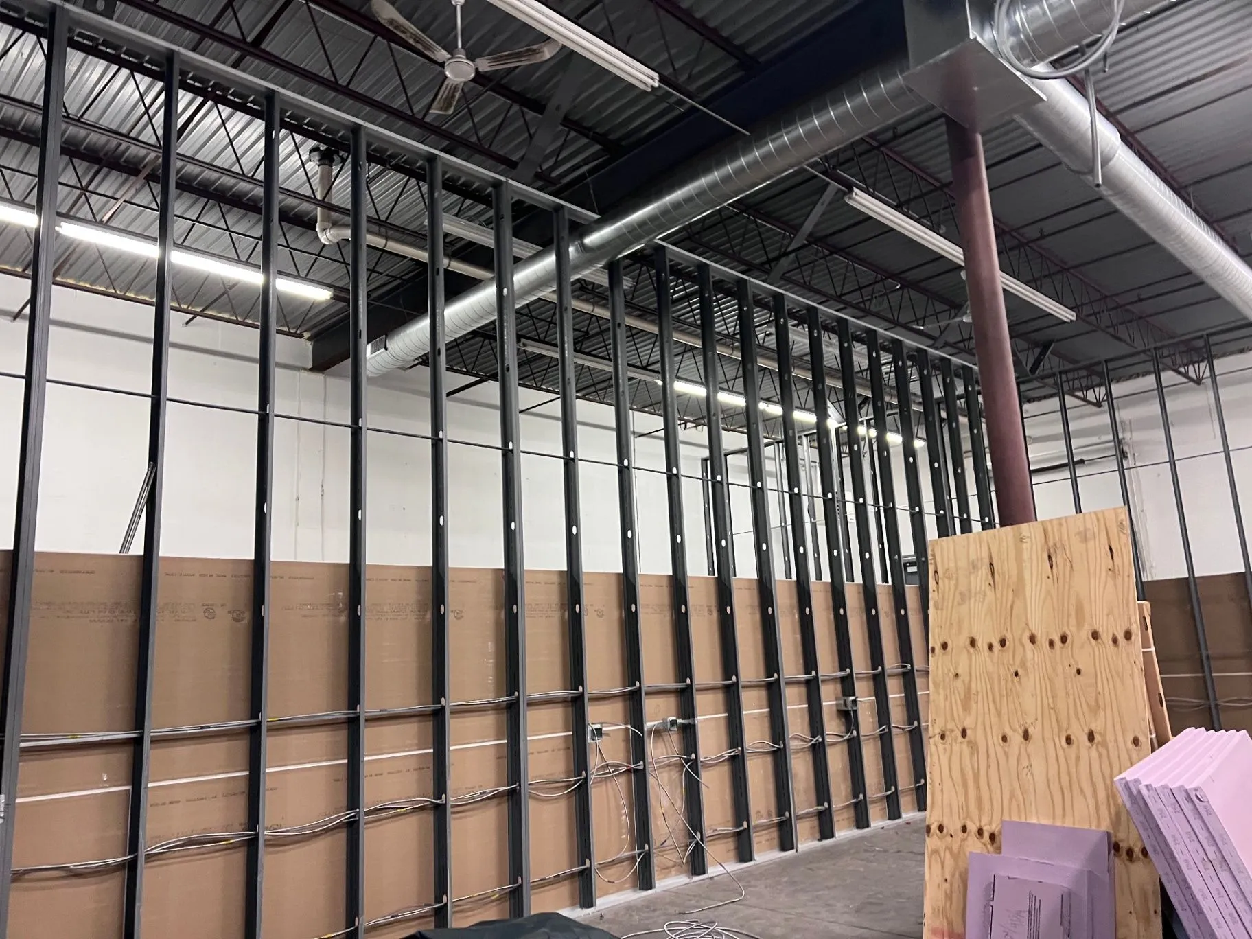 Commercial wall framing and insulation before drywall installation in Eden Prairie, MN