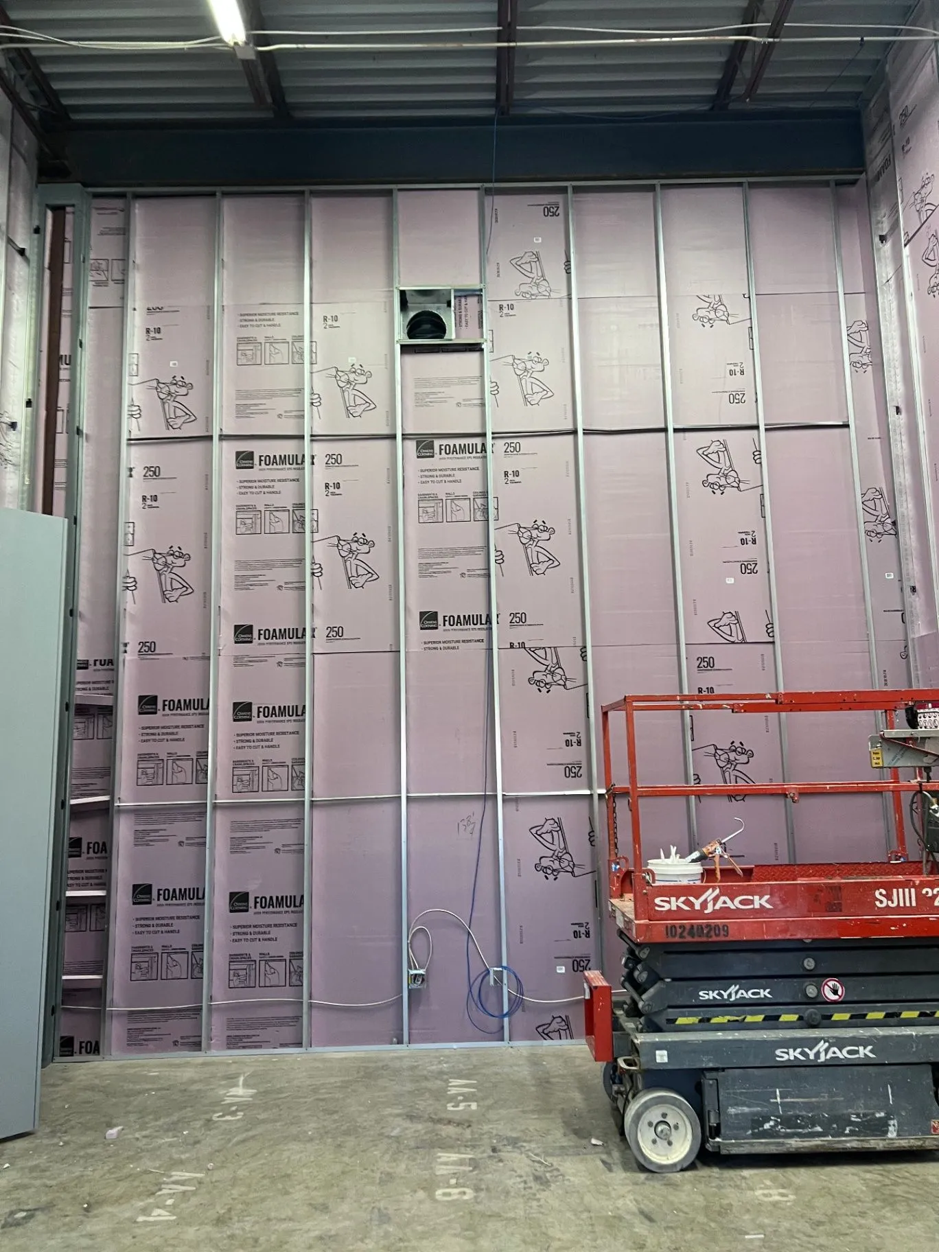Interior metal framing and building services before drywall installation in Eden Prairie, MN