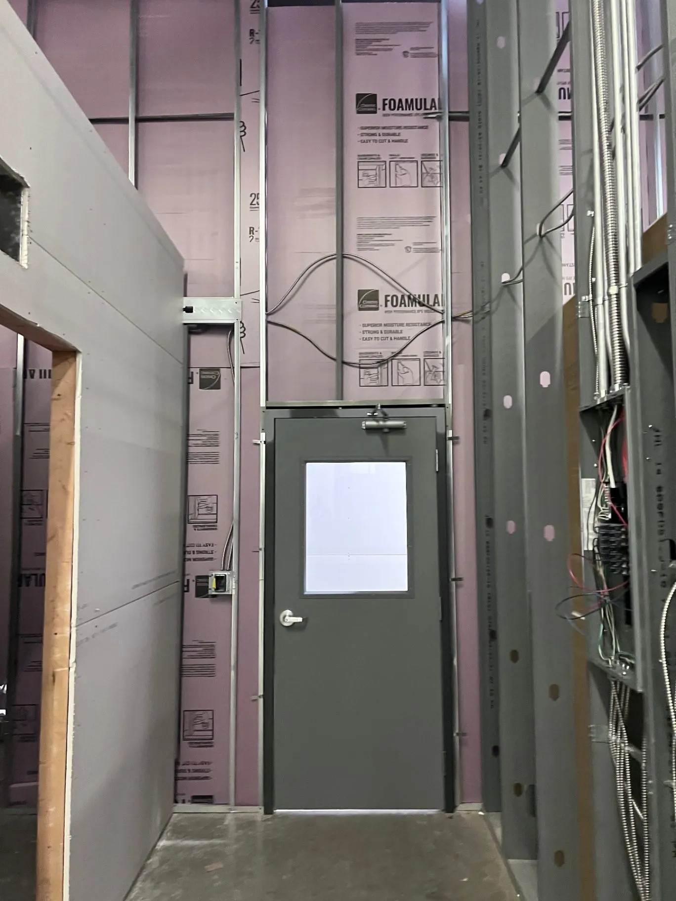 Framed commercial interior ready for drywall work in Eden Prairie, MN