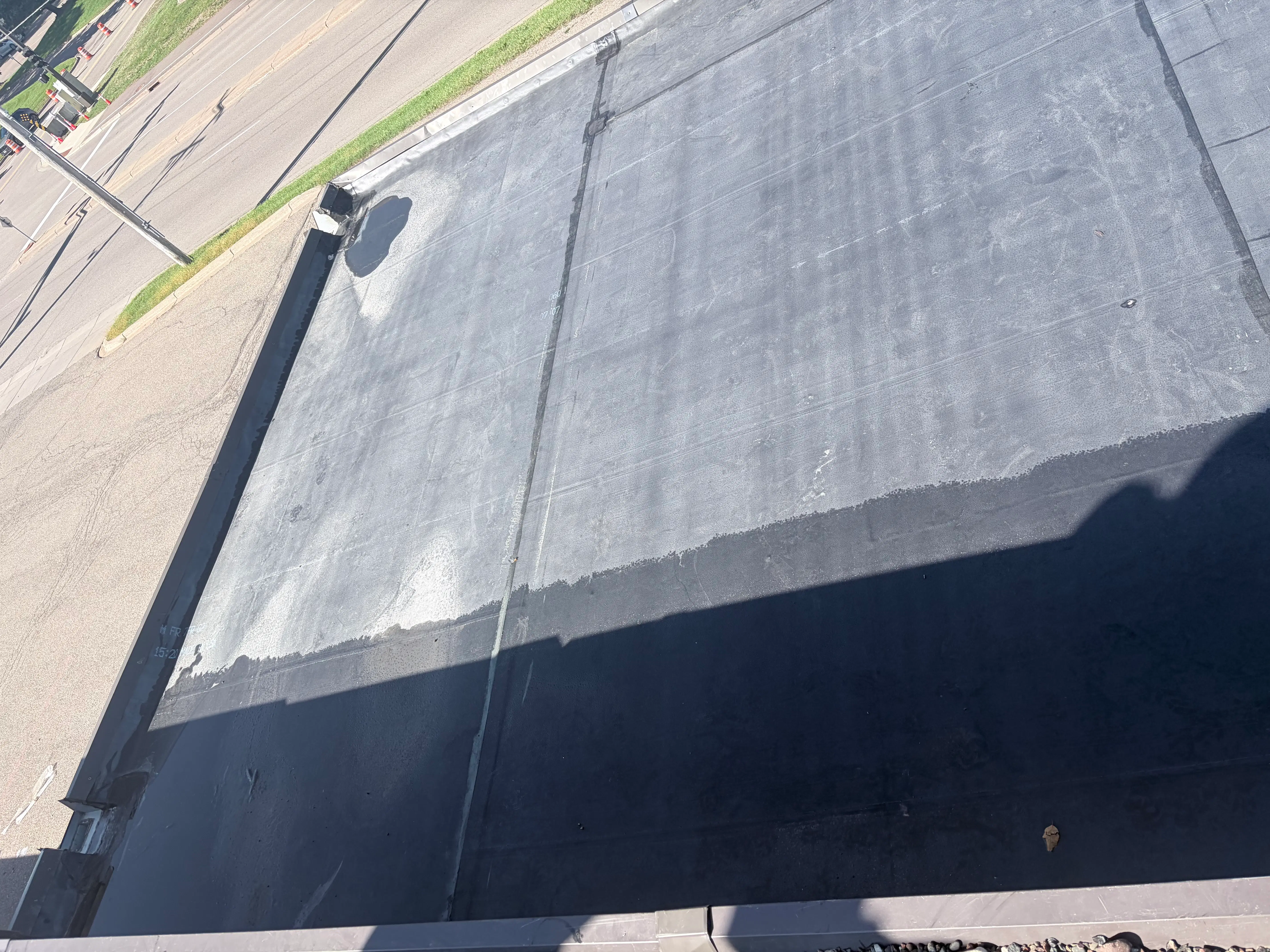 New EPDM membrane surface installed across a commercial flat roof in Plymouth, MN