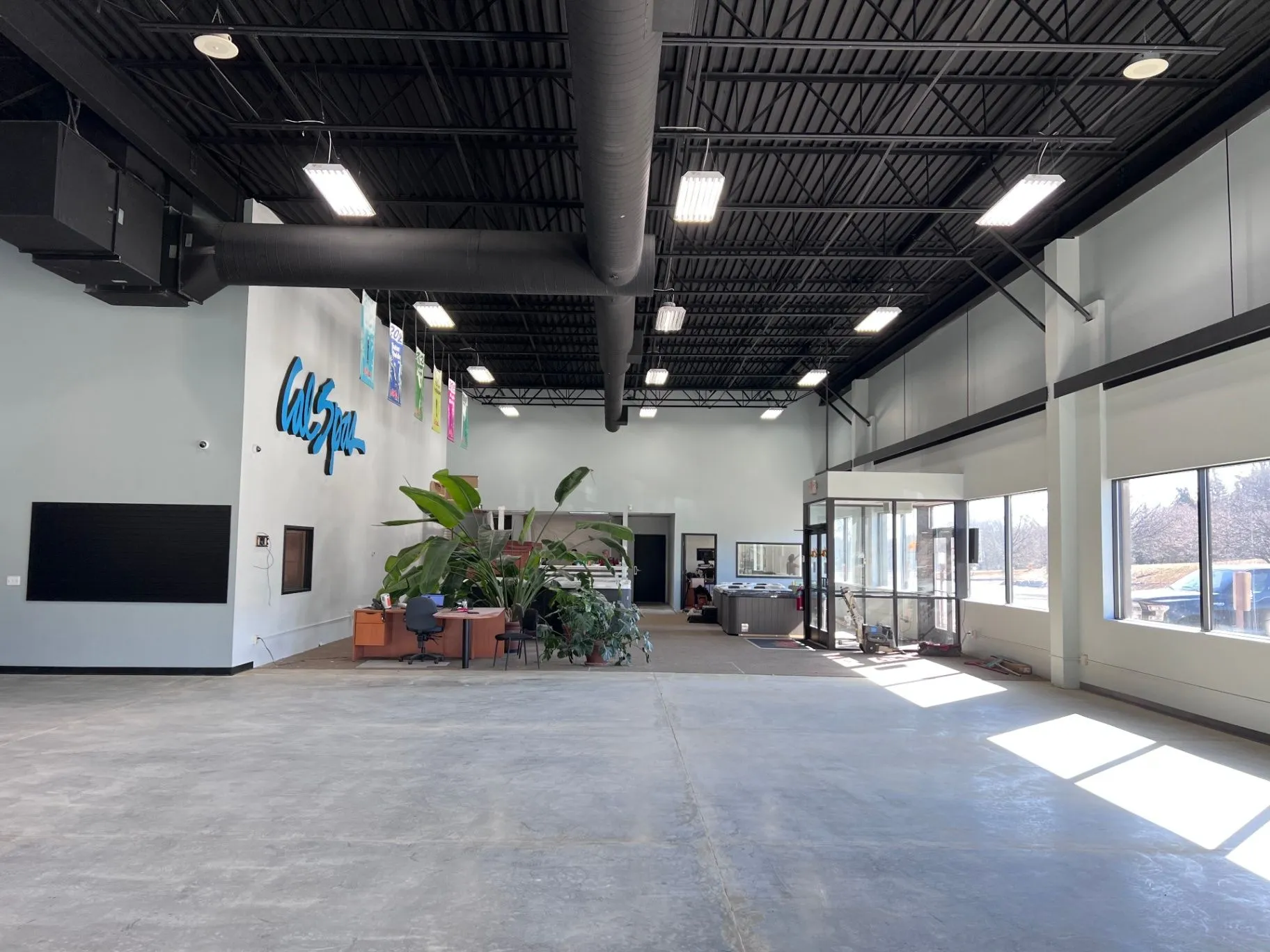 Finished painted showroom walls and ceiling at Cal Spas in Plymouth, MN