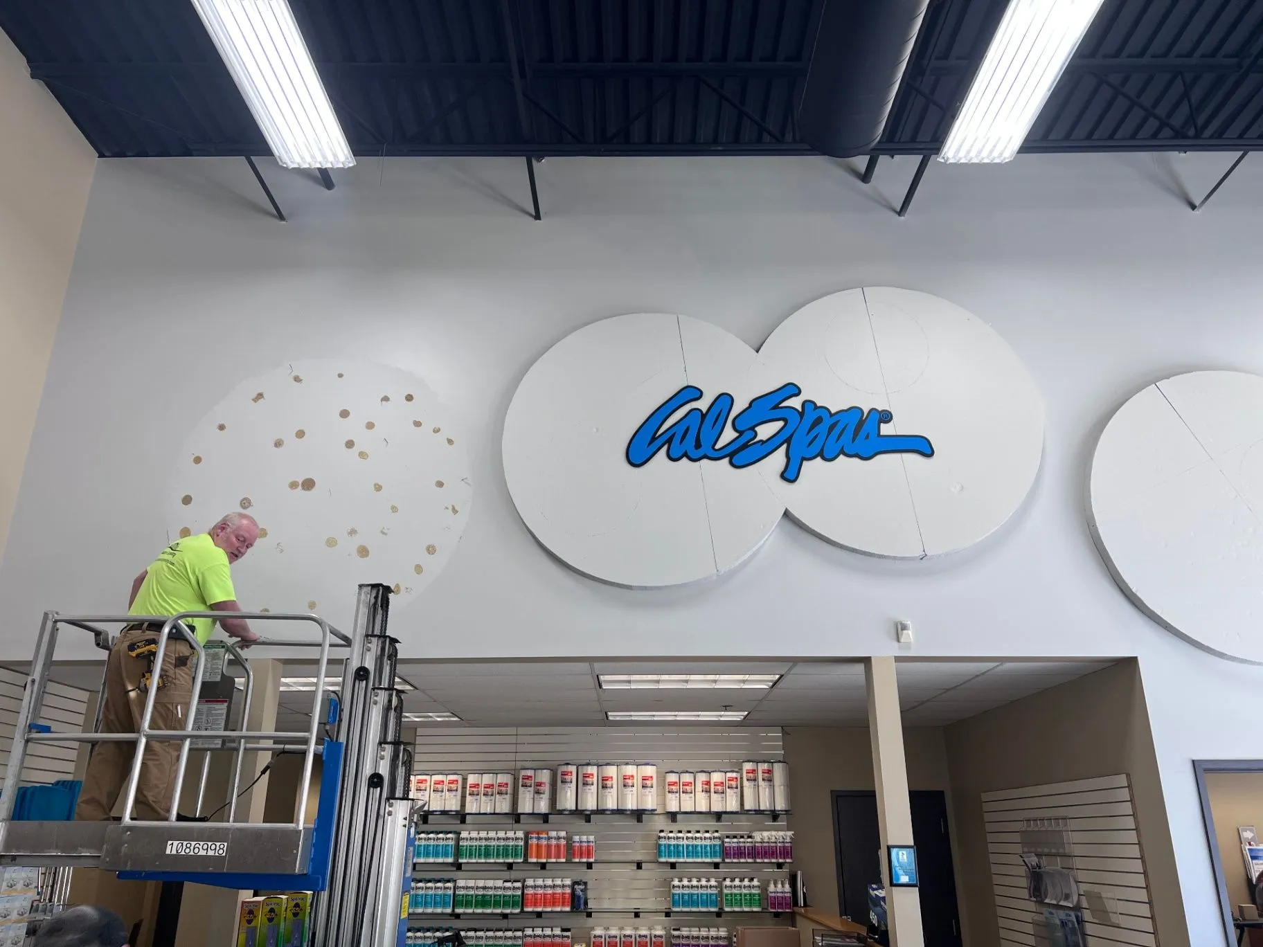 Metal wall framing beneath the ceiling during commercial interior painting work in Plymouth, MN