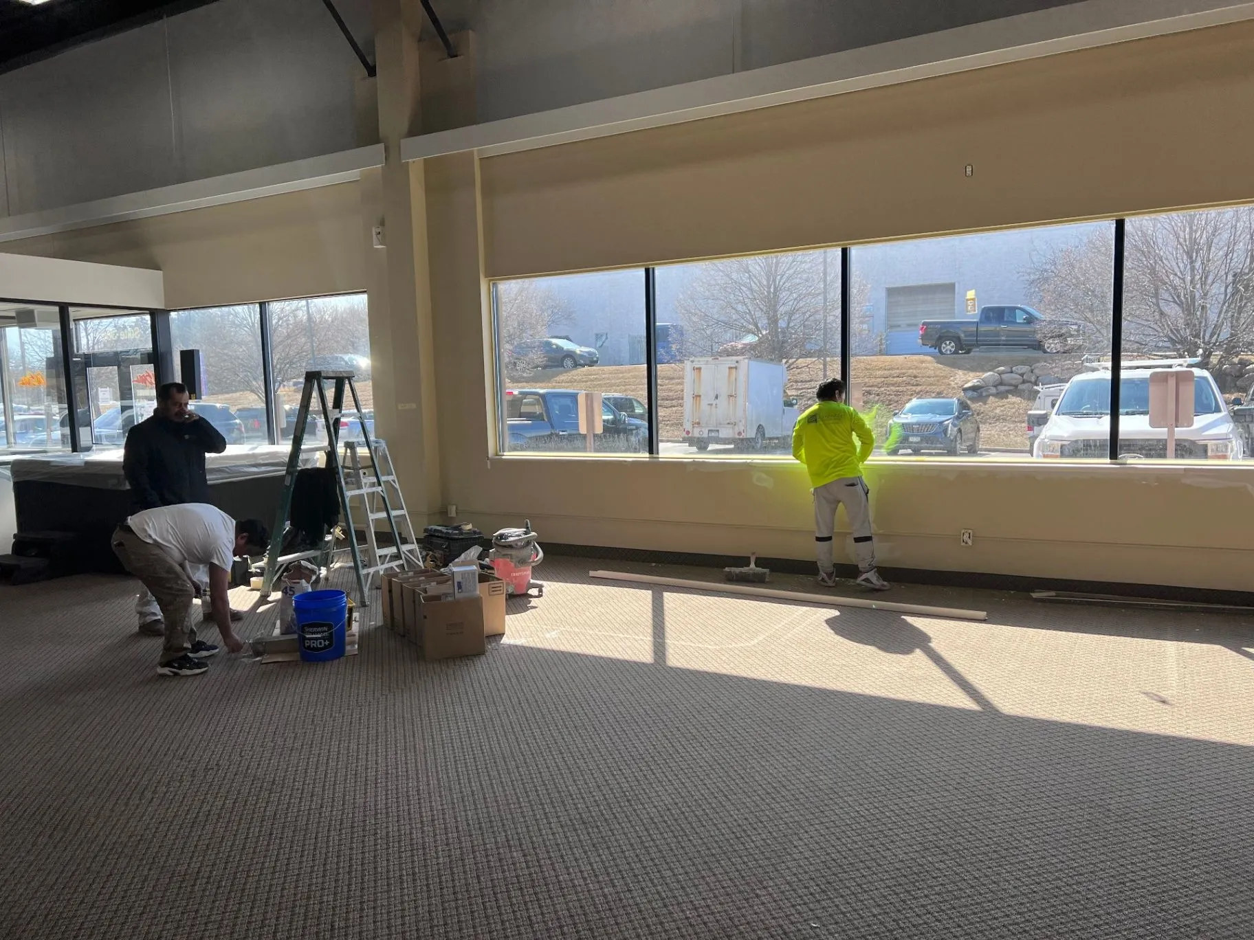 Showroom walls and ceiling during interior commercial painting in Plymouth, MN