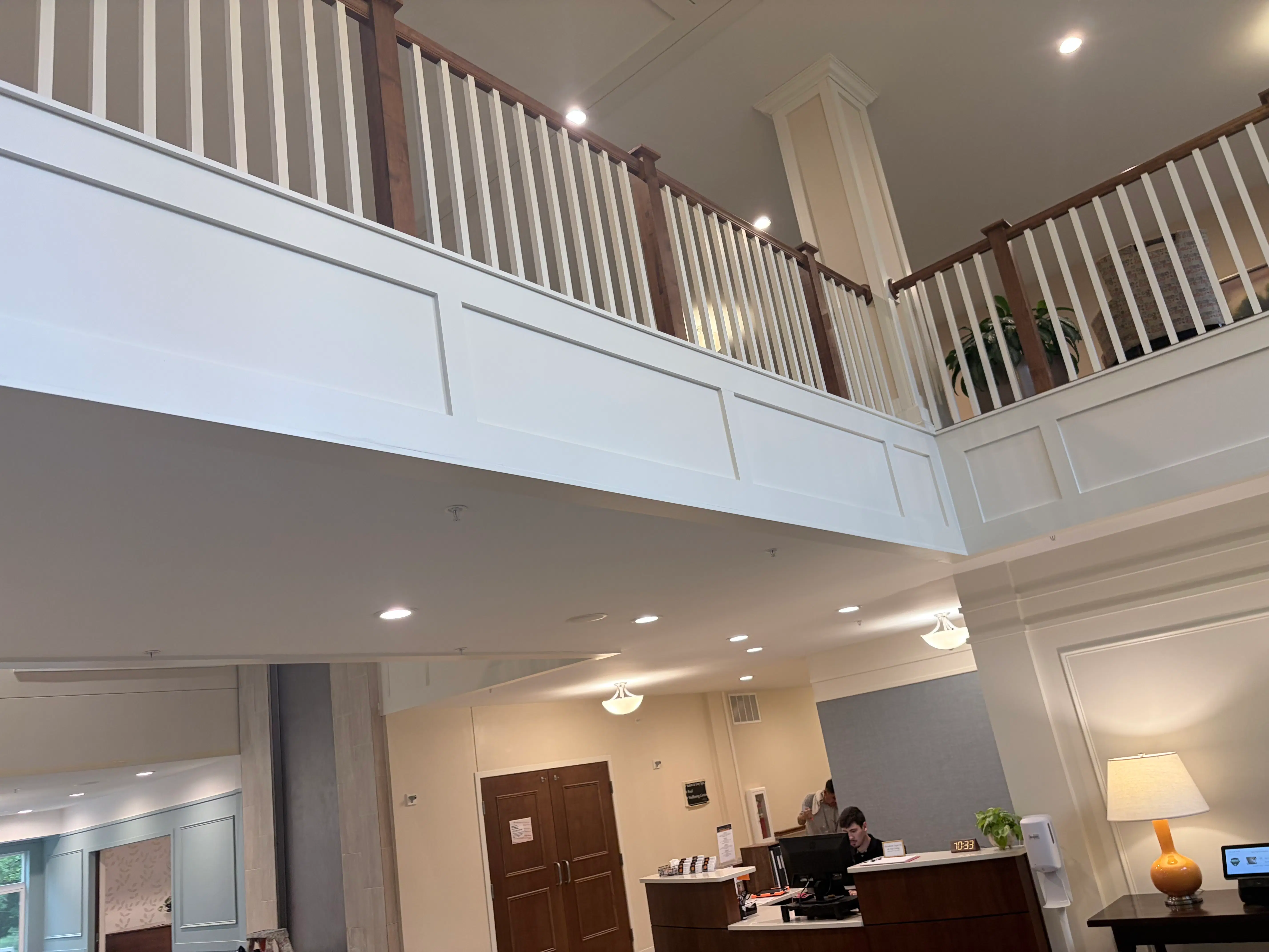 Painted trim and wood railing details at The Waters of Edina senior living community in Edina, MN